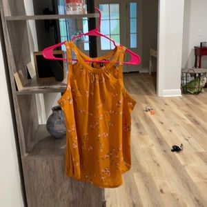 Gold floral printed tank top.